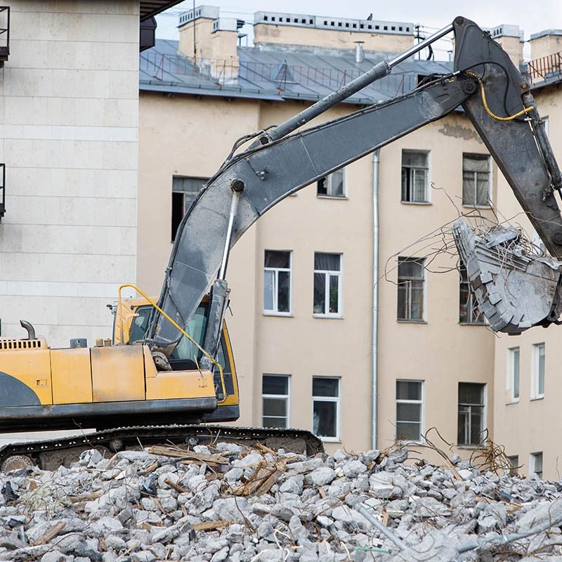 building-demolition-with-hydraulic-excavator-destr-2021-09-01-19-02-30-utc-copy.jpg